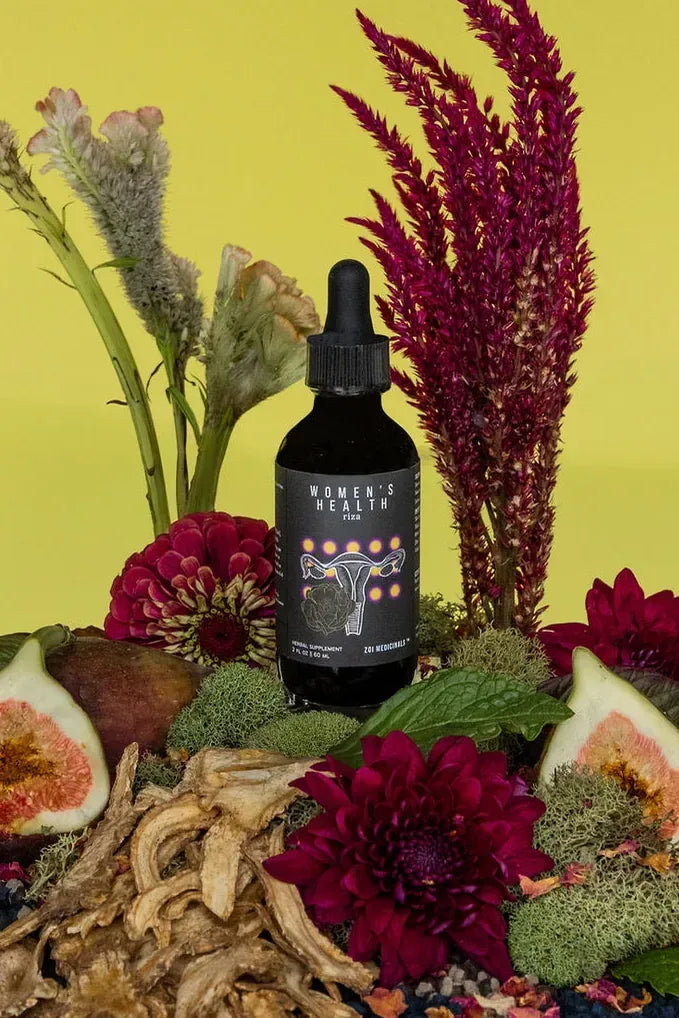 Women's Health · Ríza herbal tincture among garden flowers and herbs